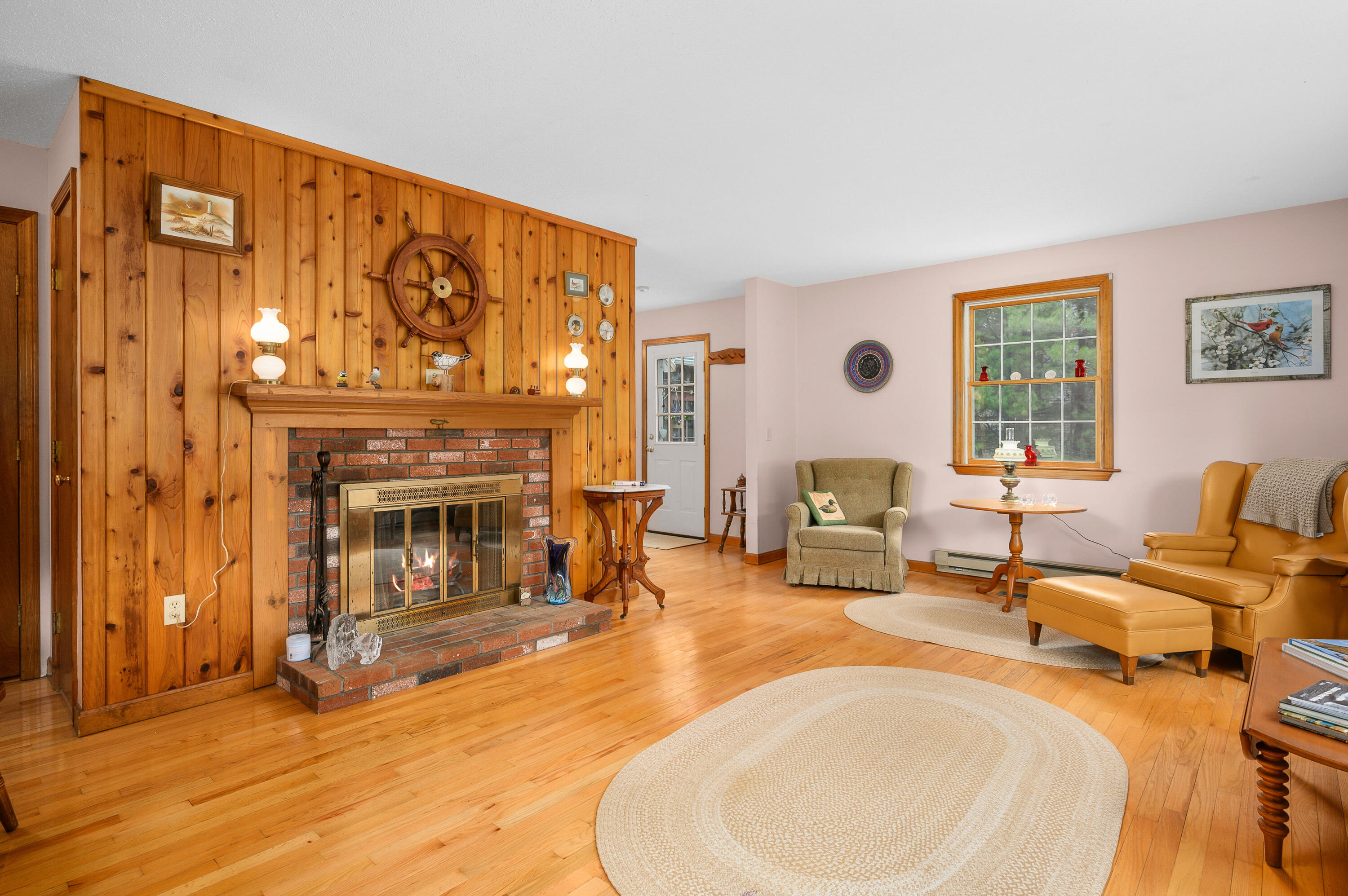 1500 Bridge Road Eastham, MA 02642 - Photo 15 of 41 a living room with furniture and a fireplace