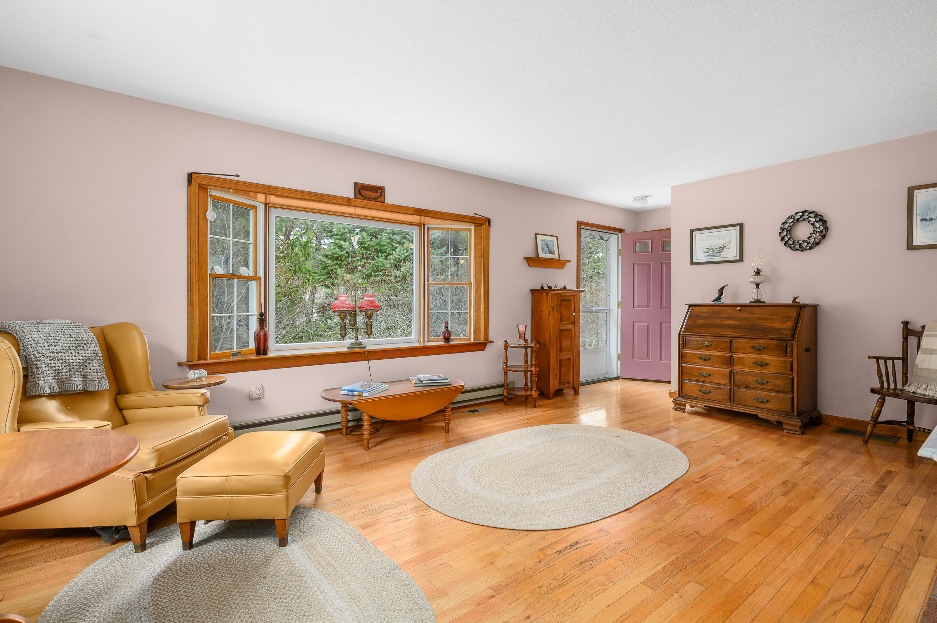 1500 Bridge Road Eastham, MA 02642 - Photo 18 of 41 a living room with furniture a window and a flat screen tv