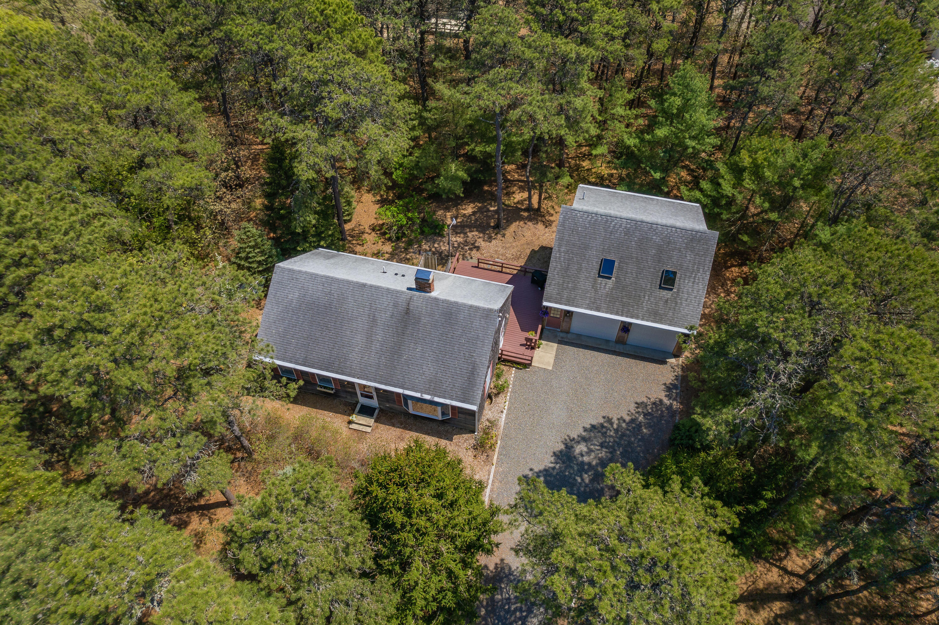 1500 Bridge Road Eastham, MA 02642 - Photo 2 of 41 an aerial view of a house with yard and outdoor seating