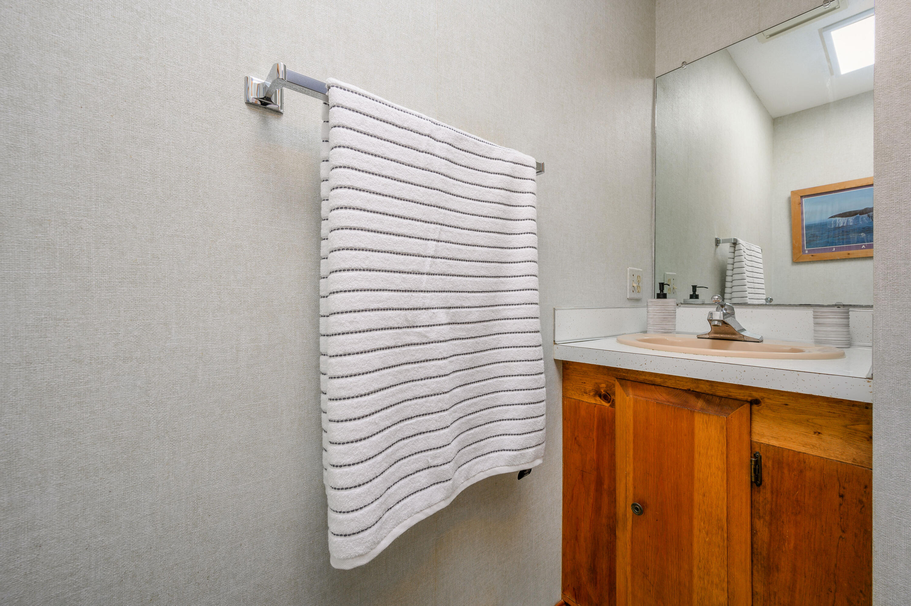 1500 Bridge Road Eastham, MA 02642 - Photo 23 of 41 a bathroom with a sink and a mirror