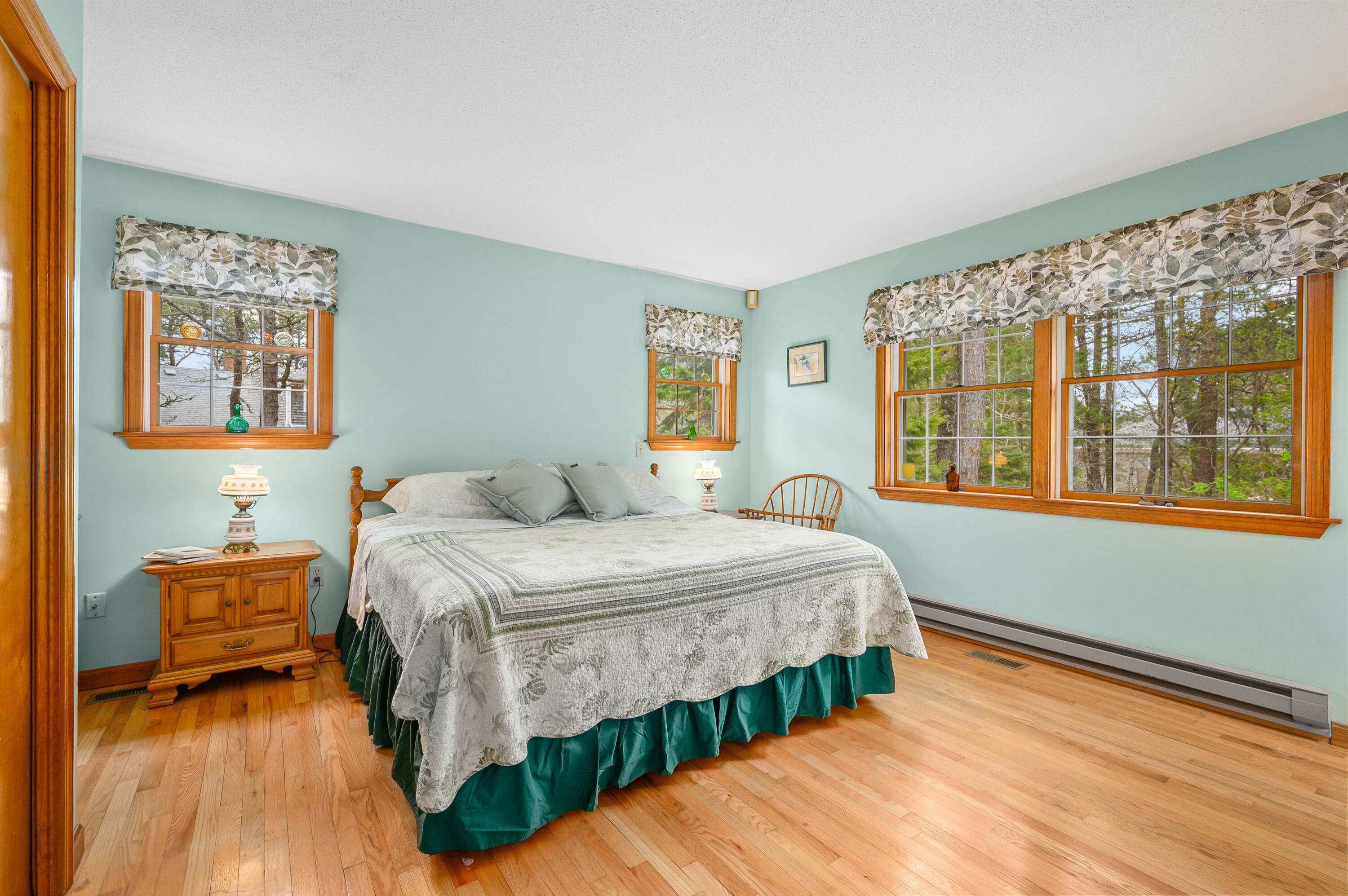 1500 Bridge Road Eastham, MA 02642 - Photo 24 of 41 a bedroom with a bed mirror and a window