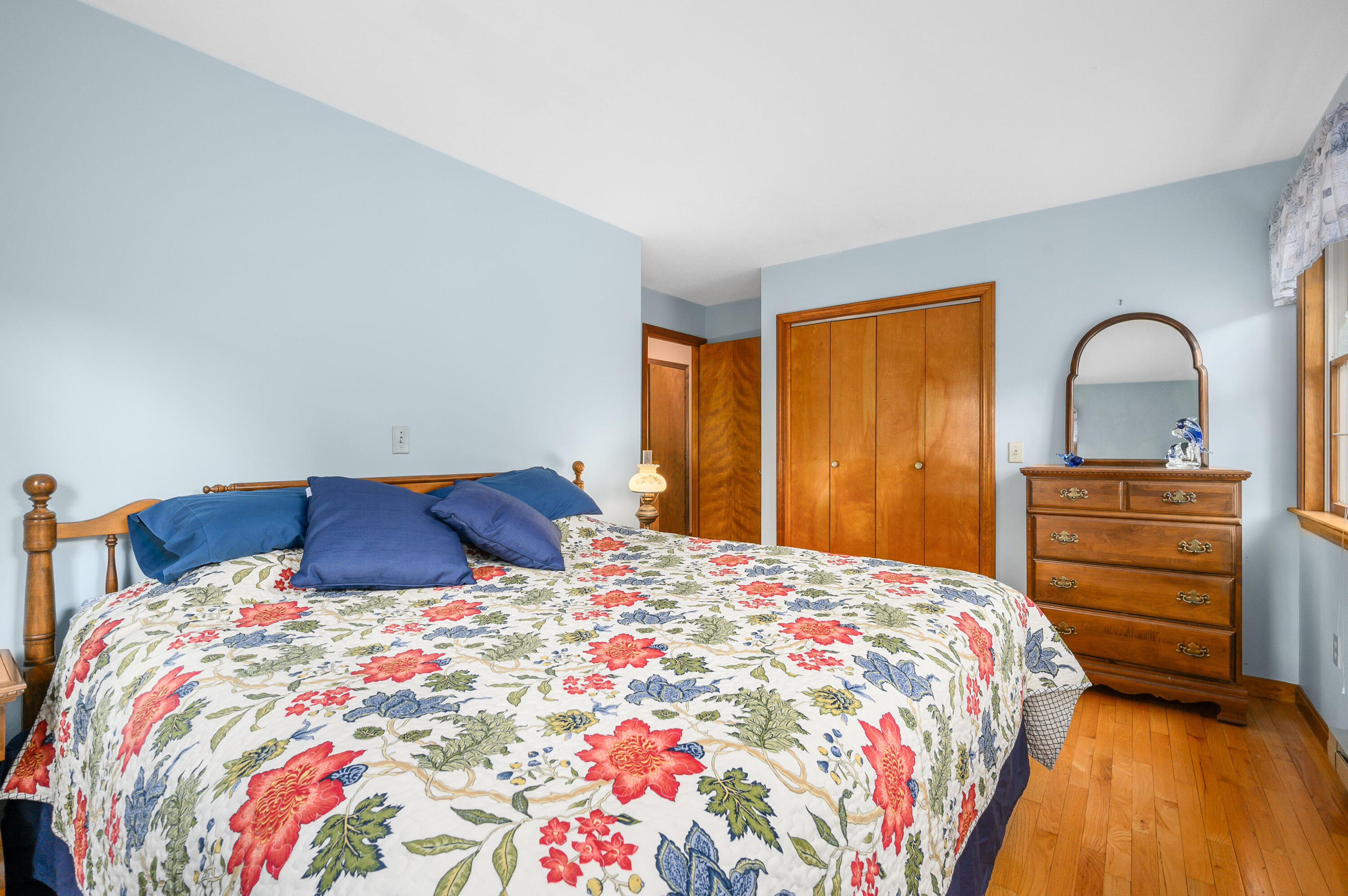 1500 Bridge Road Eastham, MA 02642 - Photo 30 of 41 a bedroom with a bed and a dresser