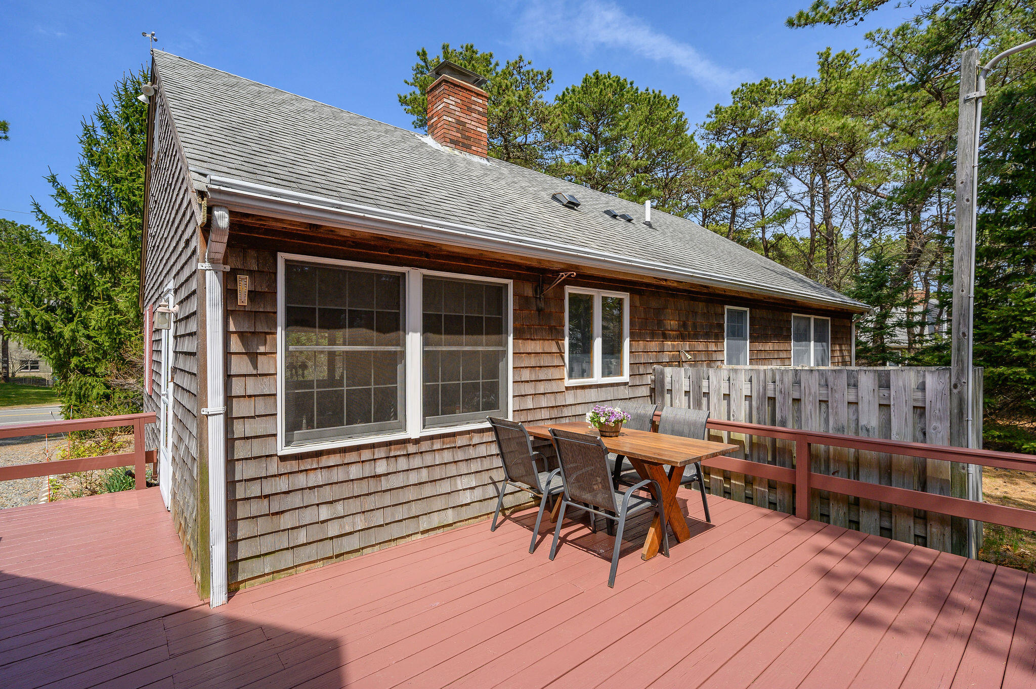 1500 Bridge Road Eastham, MA 02642 - Photo 34 of 41 a view of a house with chairs and wooden floor