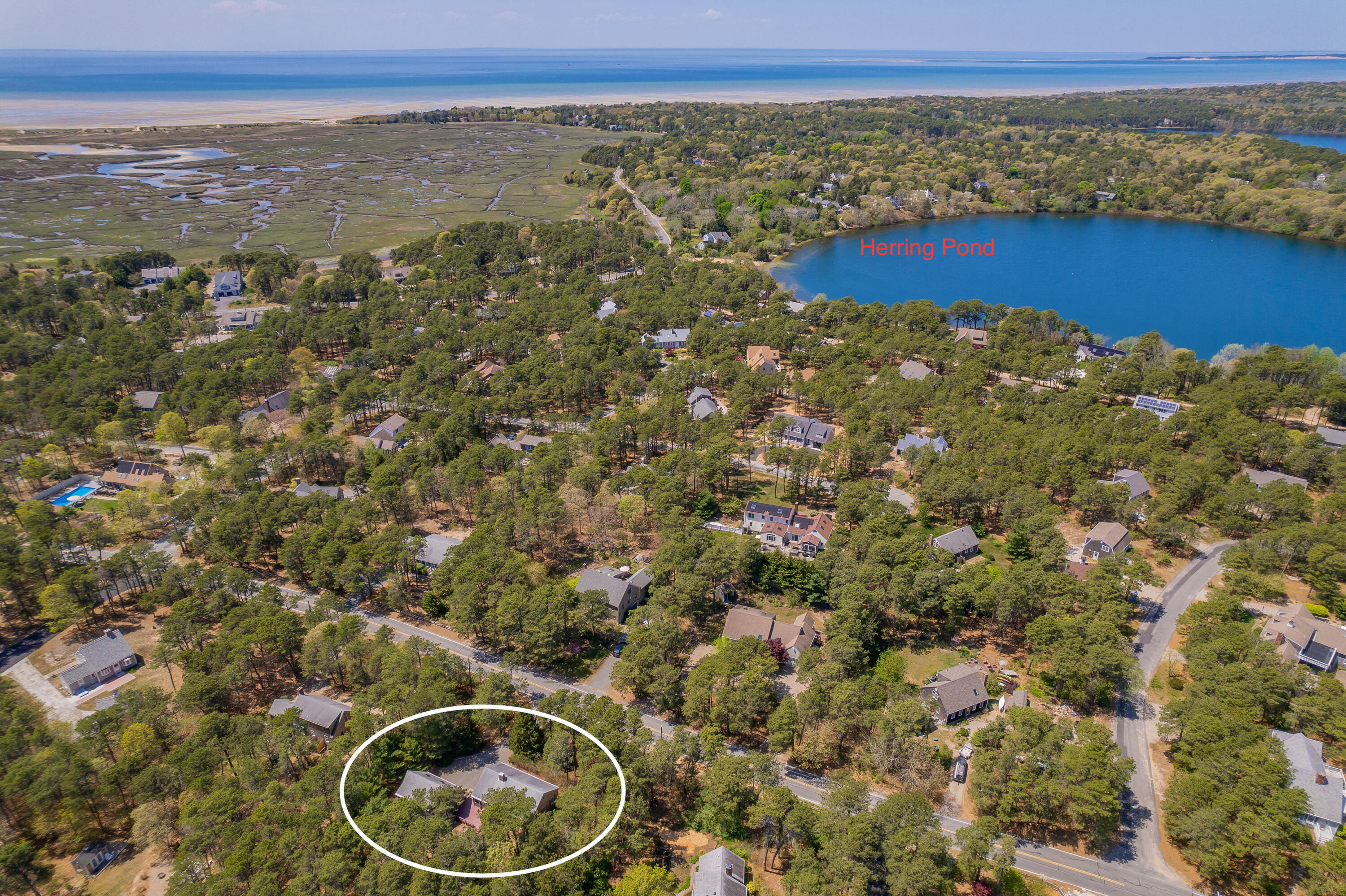 1500 Bridge Road Eastham, MA 02642 - Photo 5 of 41 a view of a city with ocean