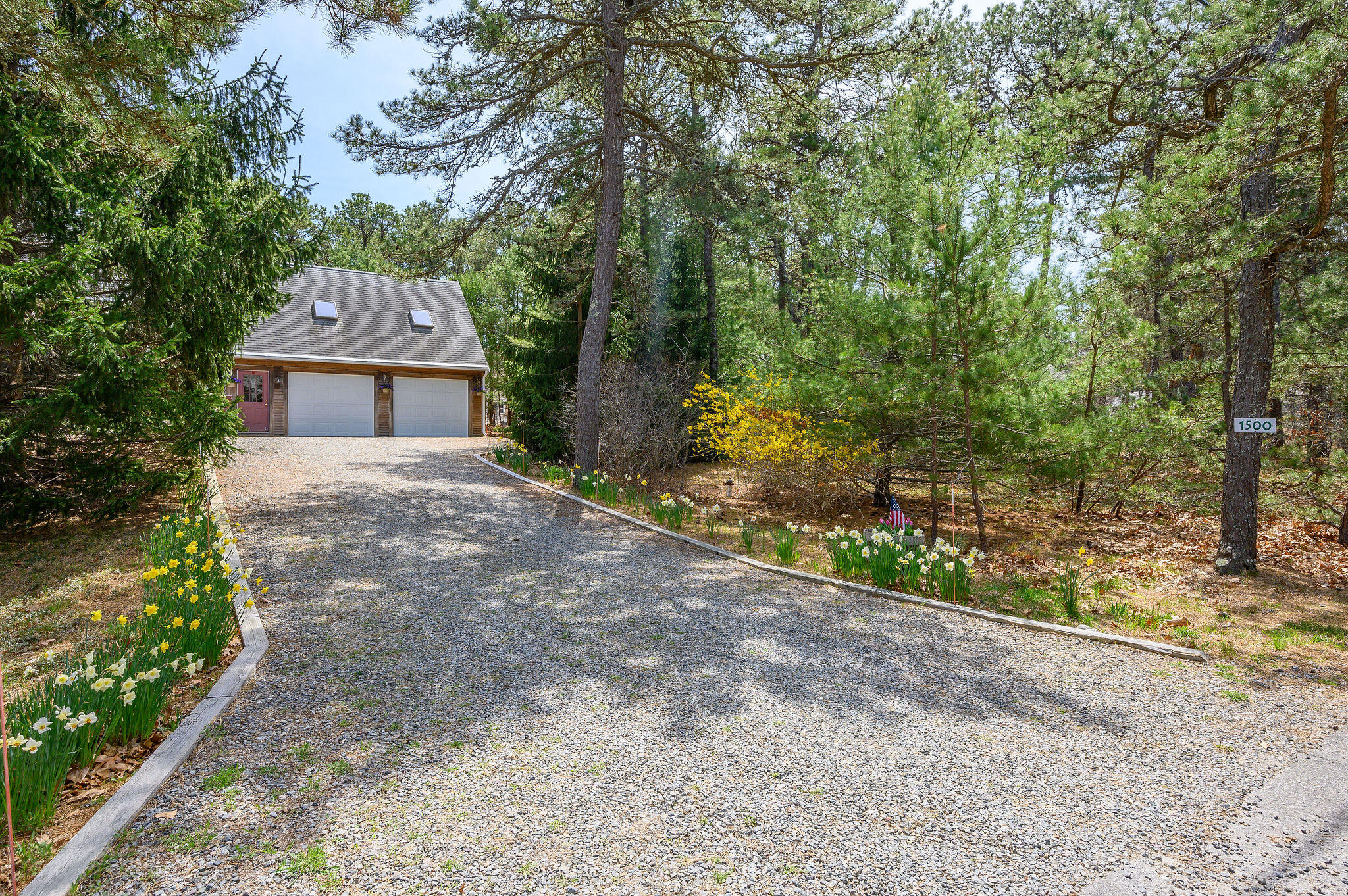 1500 Bridge Road Eastham, MA 02642 - Photo 7 of 41 a front view of a house with a yard and tree s