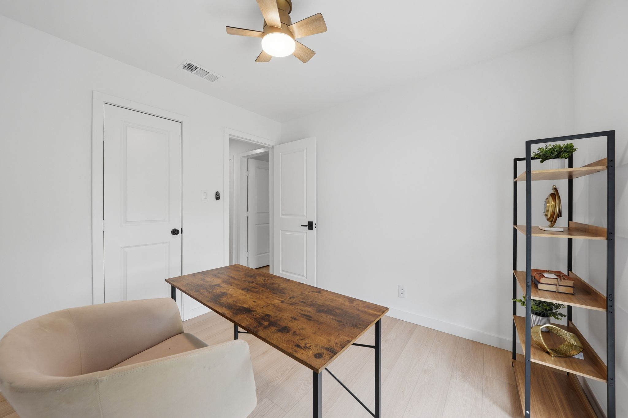 6804 Meadow Run Austin, TX 78745 - Photo 22 of 34 This room features light-colored flooring and white walls, creating a bright and airy atmosphere