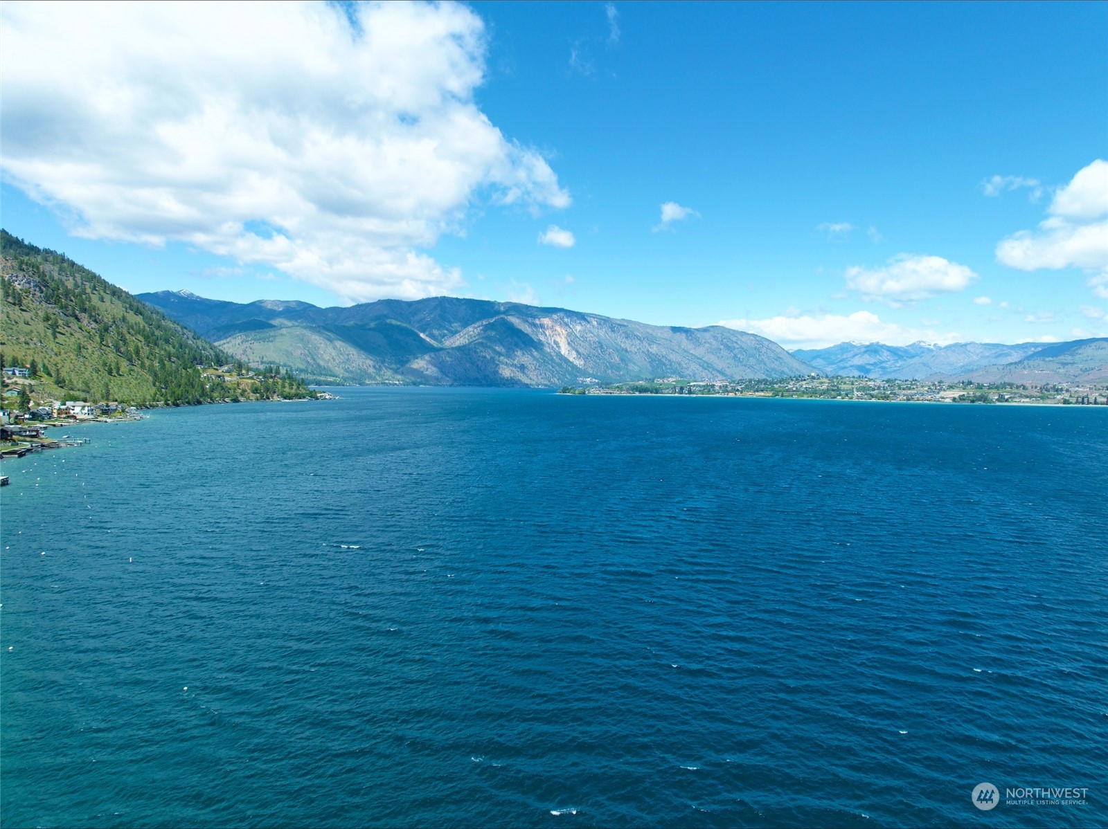 2650 South Lakeshore Road Chelan, WA 98816 - Photo 5 of 13 a view of an ocean with a mountain