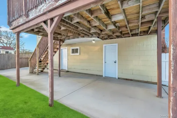 a view of a big room with staircase