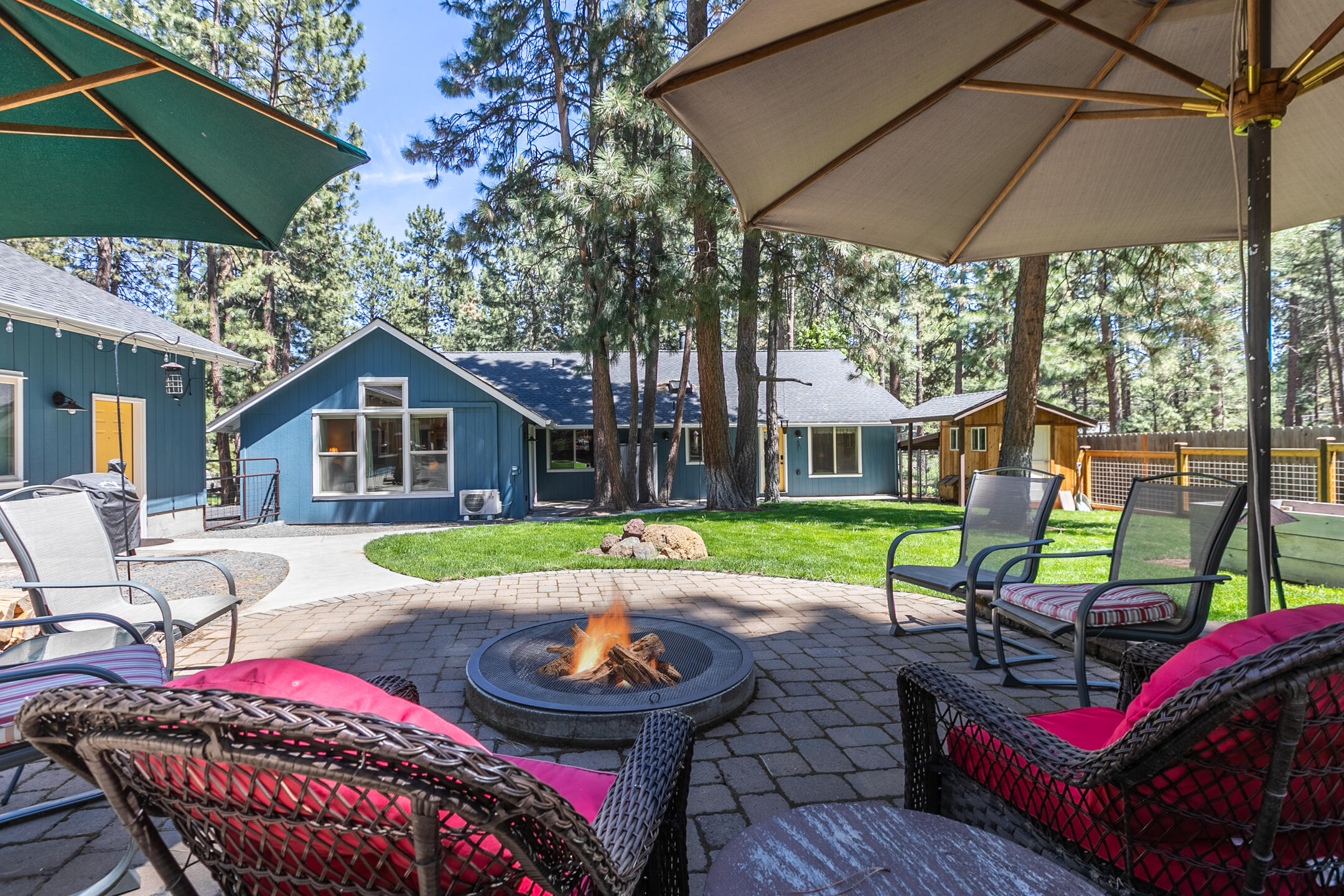 19175 Kiowa Road Bend, OR 97702 - Photo 25 of 44 Large paver area with fire pit to relax quietly or entertain.