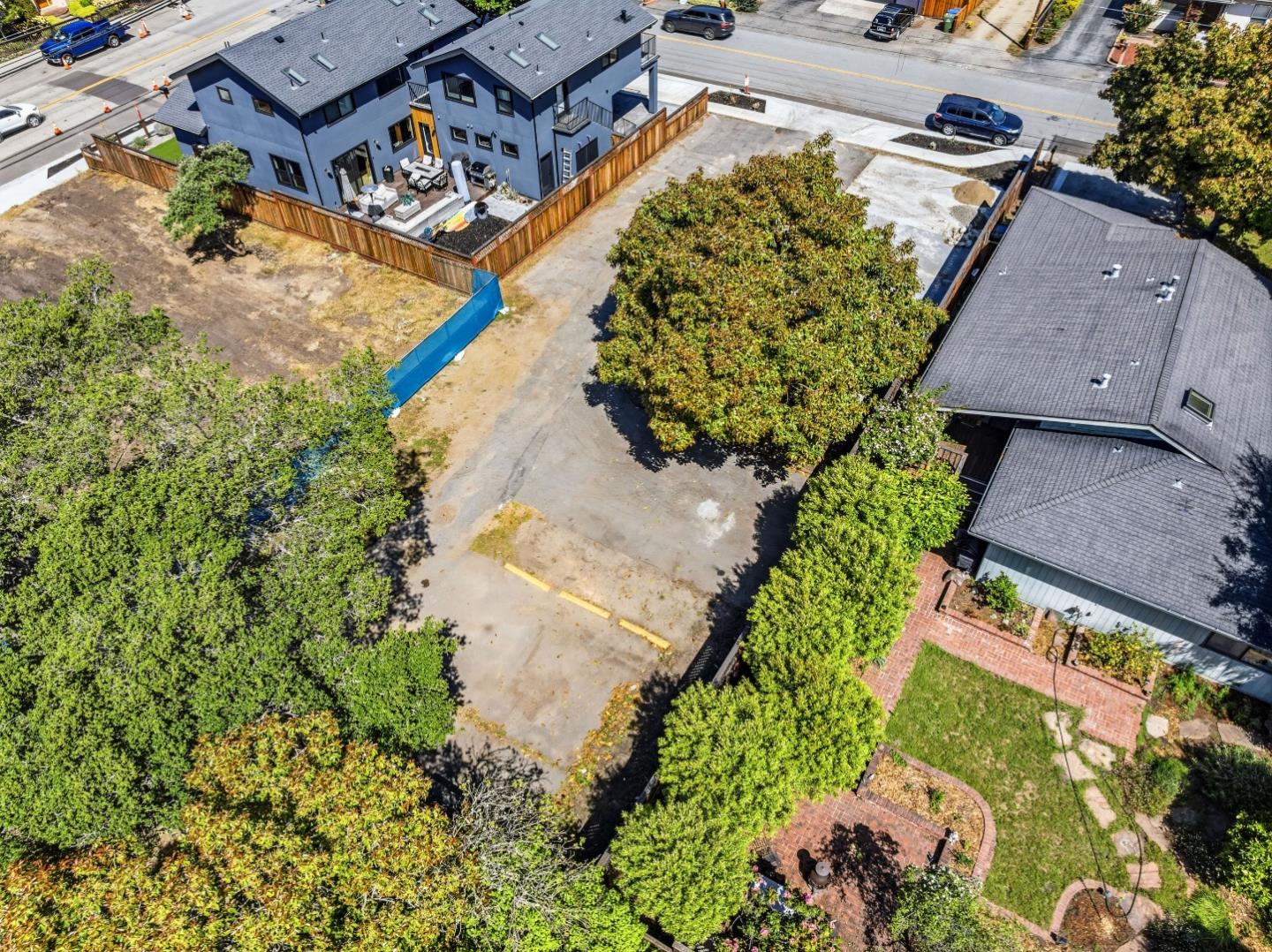 4920-4924 Bridge Street Soquel, CA 95073 - Photo 18 of 24 an aerial view of a house with a yard and a garden