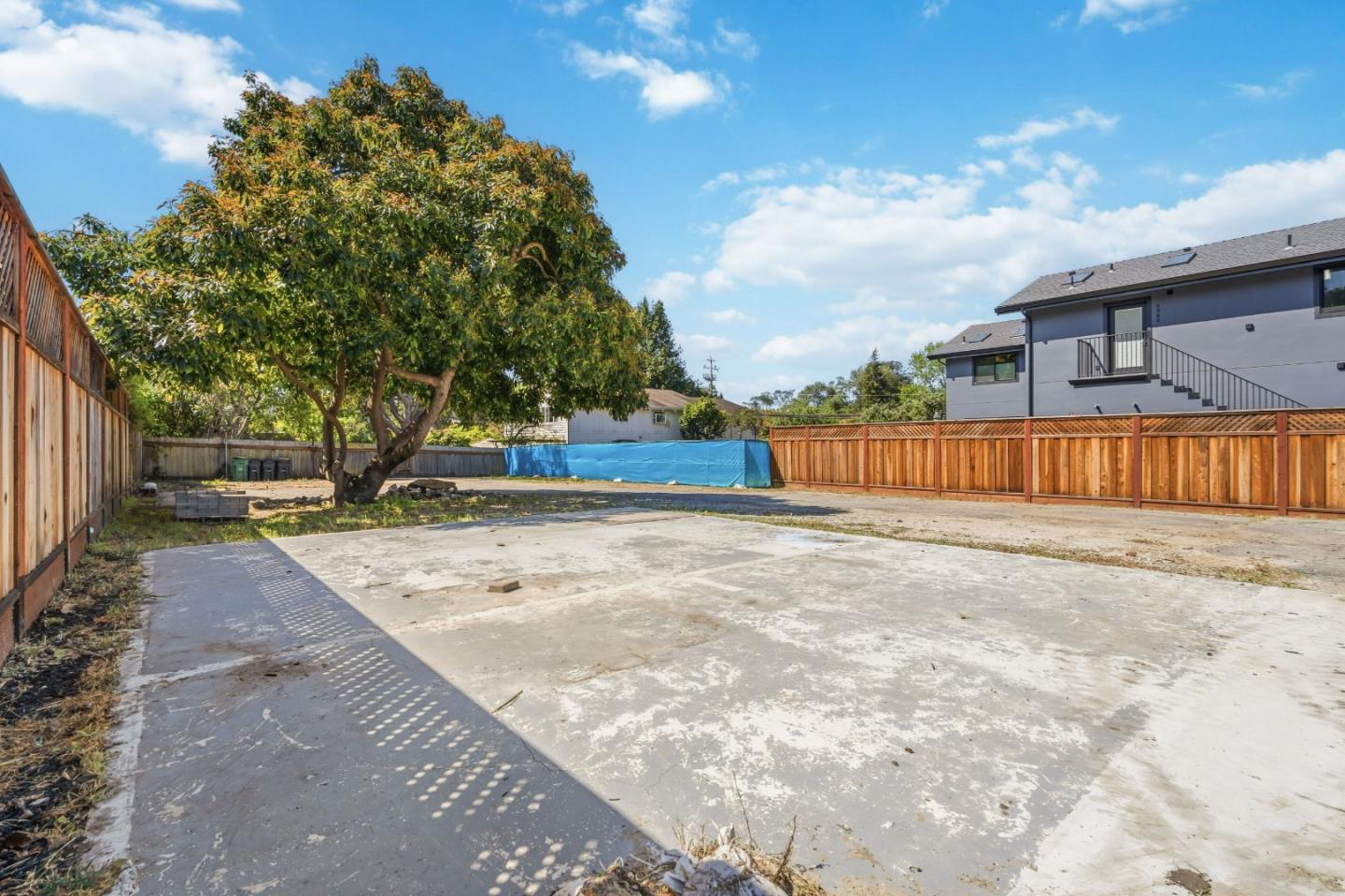 4920-4924 Bridge Street Soquel, CA 95073 - Photo 9 of 24 a view of a backyard with large trees