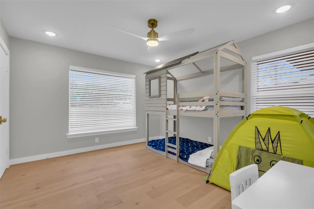 11107 Hillcrest Road Dallas, TX 75230 - Photo 19 of 29 a view of a room with gym equipment