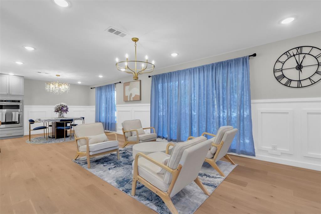 11107 Hillcrest Road Dallas, TX 75230 - Photo 2 of 29 a view of a livingroom with furniture and a large window