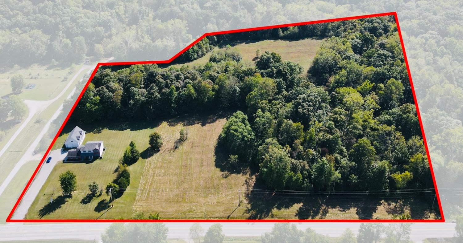 Property includes 2 Tracts totaling 14 Acres( the home, 30 x 40 garage w/ a loft & 3 acres can be purchased separatly for $410,000 & the 11 acre tract w/ 500' of Road frontage next-door that can be purchased separately for $129,000)