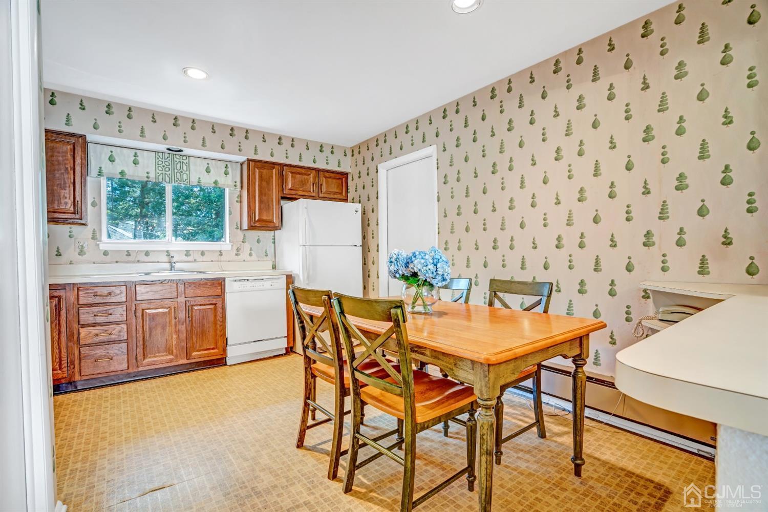 786 Pompton Road, Unit B Monroe Township, NJ 08831 - Photo 14 of 28 a view of a dining room with furniture and window