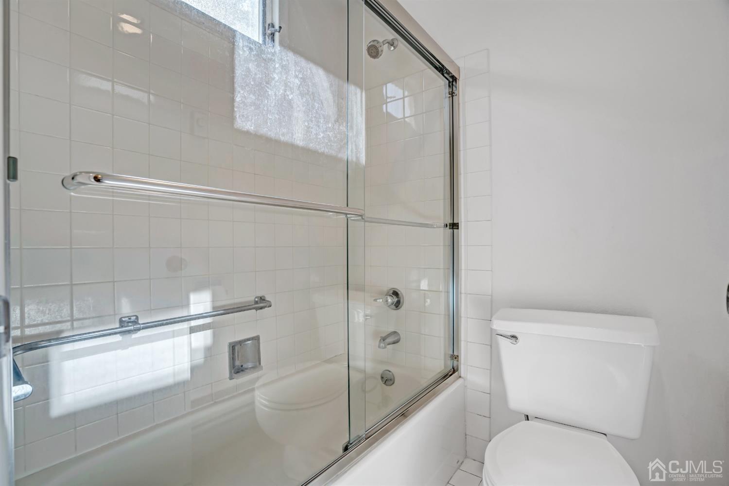786 Pompton Road, Unit B Monroe Township, NJ 08831 - Photo 25 of 28 a bathroom with a toilet and a shower