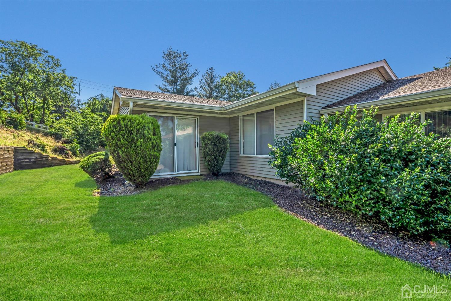 786 Pompton Road, Unit B Monroe Township, NJ 08831 - Photo 26 of 28 a view of a house with a yard