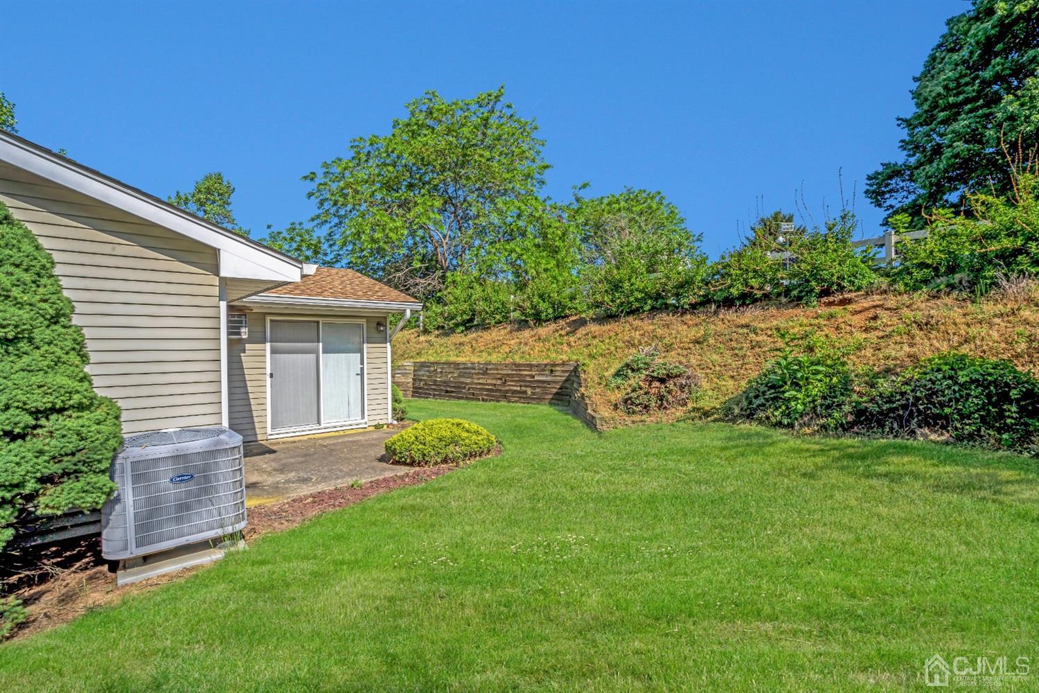 786 Pompton Road, Unit B Monroe Township, NJ 08831 - Photo 27 of 28 a front view of a house with garden