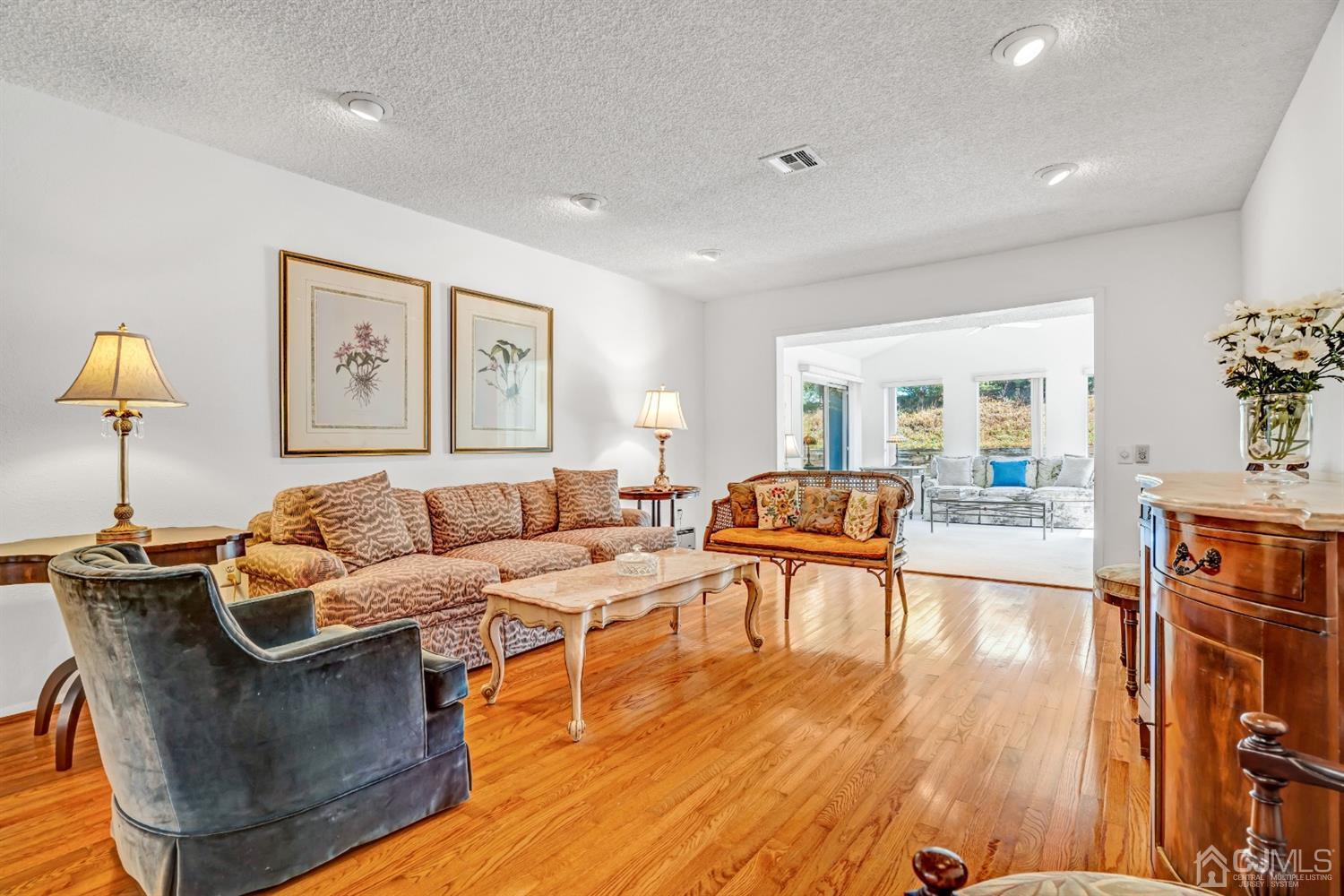 786 Pompton Road, Unit B Monroe Township, NJ 08831 - Photo 5 of 28 a living room with furniture and a wooden floor