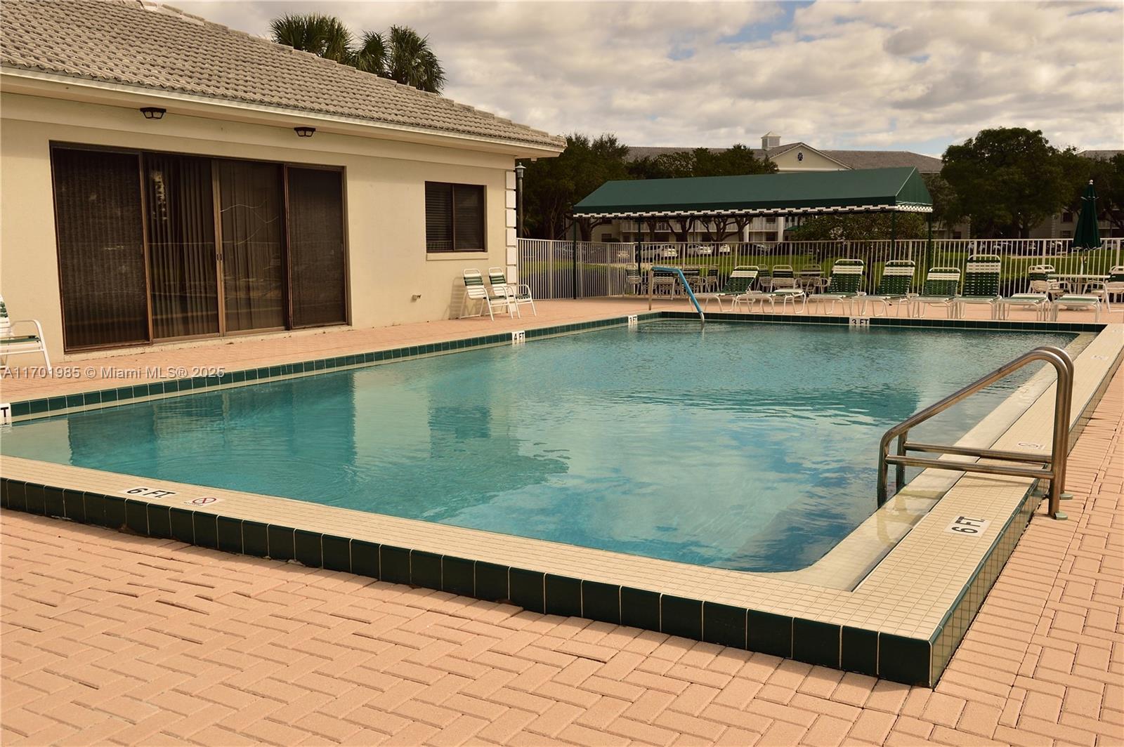 6085 Balboa Circle, Unit 402 Boca Raton, FL 33433 - Photo 20 of 21 a view of a terrace with skyline