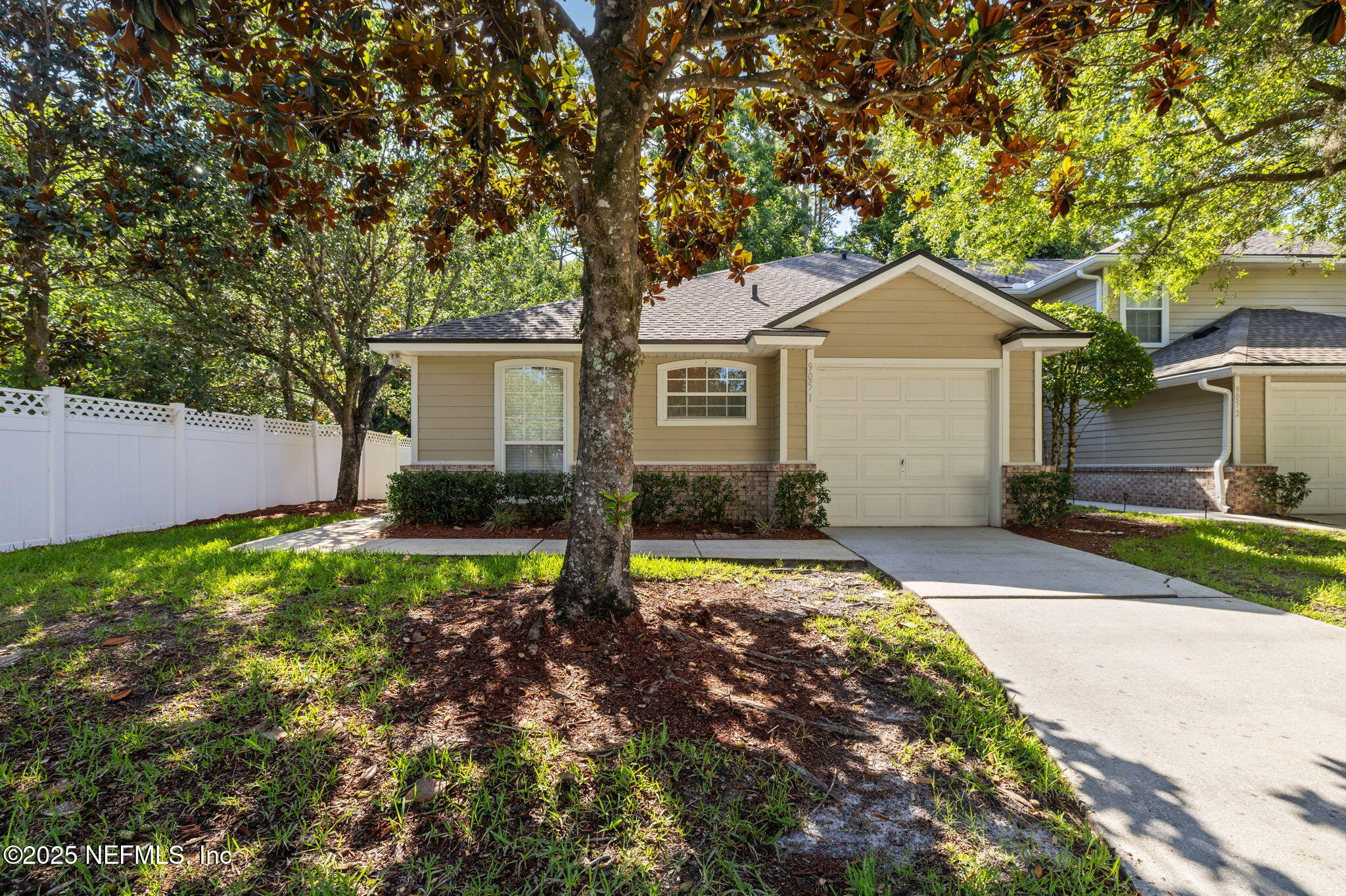 905 Country Bridge Road, Unit 1 St. Johns, FL 32259 - Photo 1 of 43 a front view of house with yard and green space
