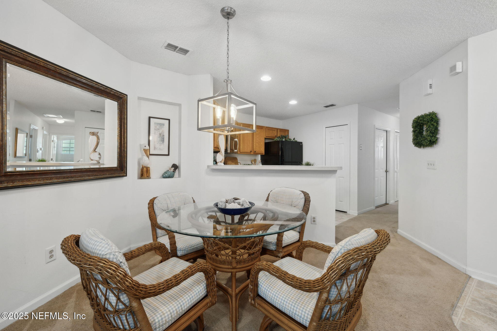 905 Country Bridge Road, Unit 1 St. Johns, FL 32259 - Photo 11 of 43 a living room with furniture and kitchen view