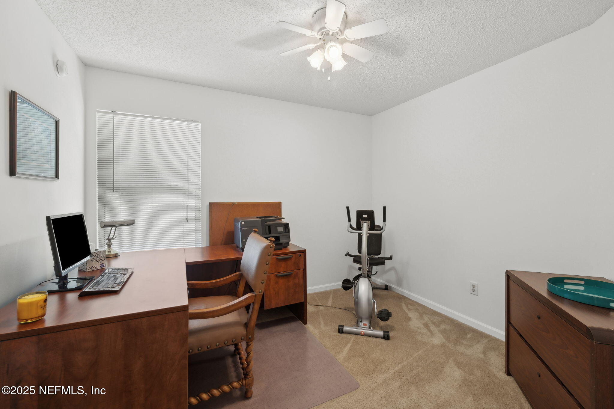 905 Country Bridge Road, Unit 1 St. Johns, FL 32259 - Photo 23 of 43 a view of a workspace with furniture and a window