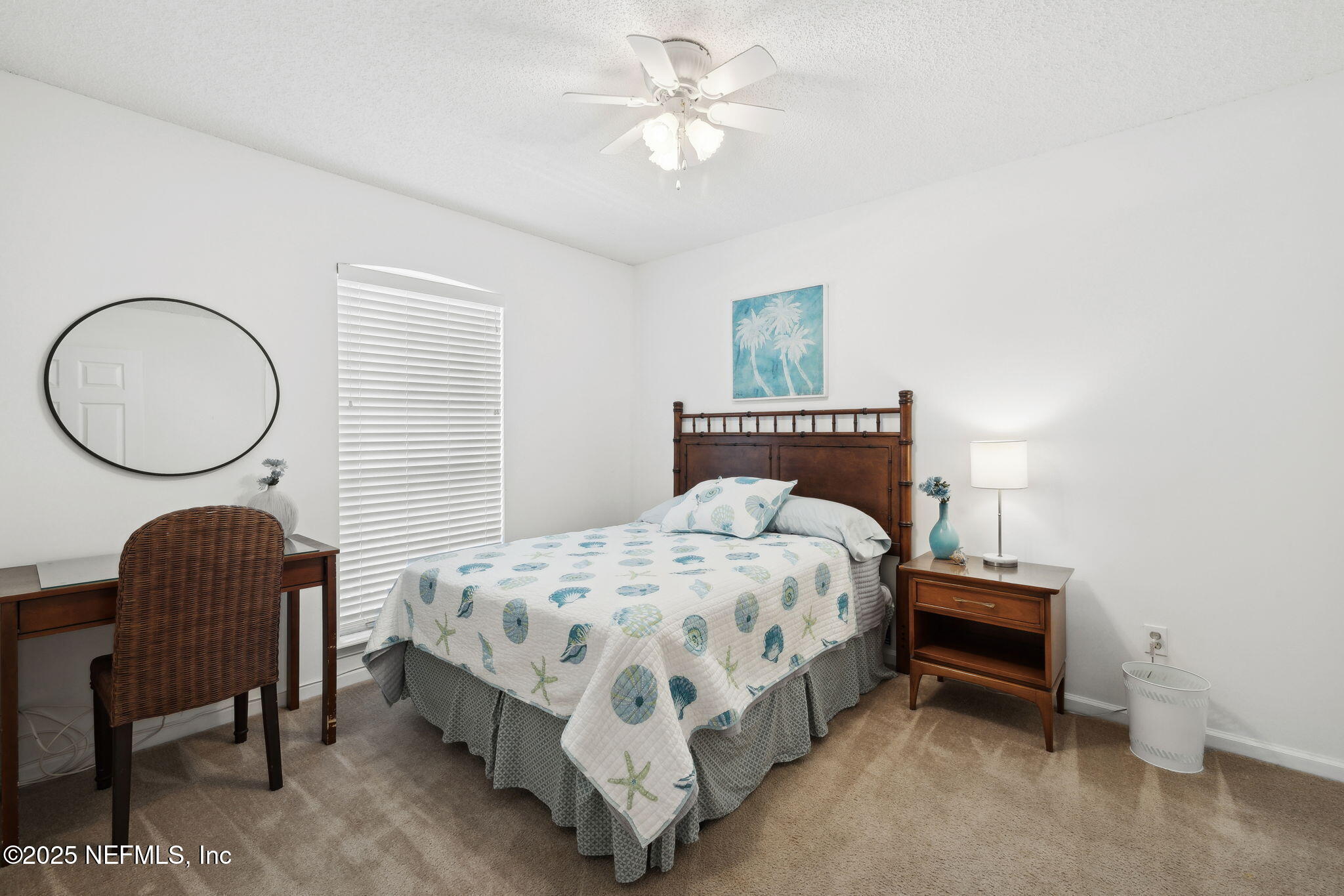 905 Country Bridge Road, Unit 1 St. Johns, FL 32259 - Photo 27 of 43 a bedroom with a bed chair and a chandelier