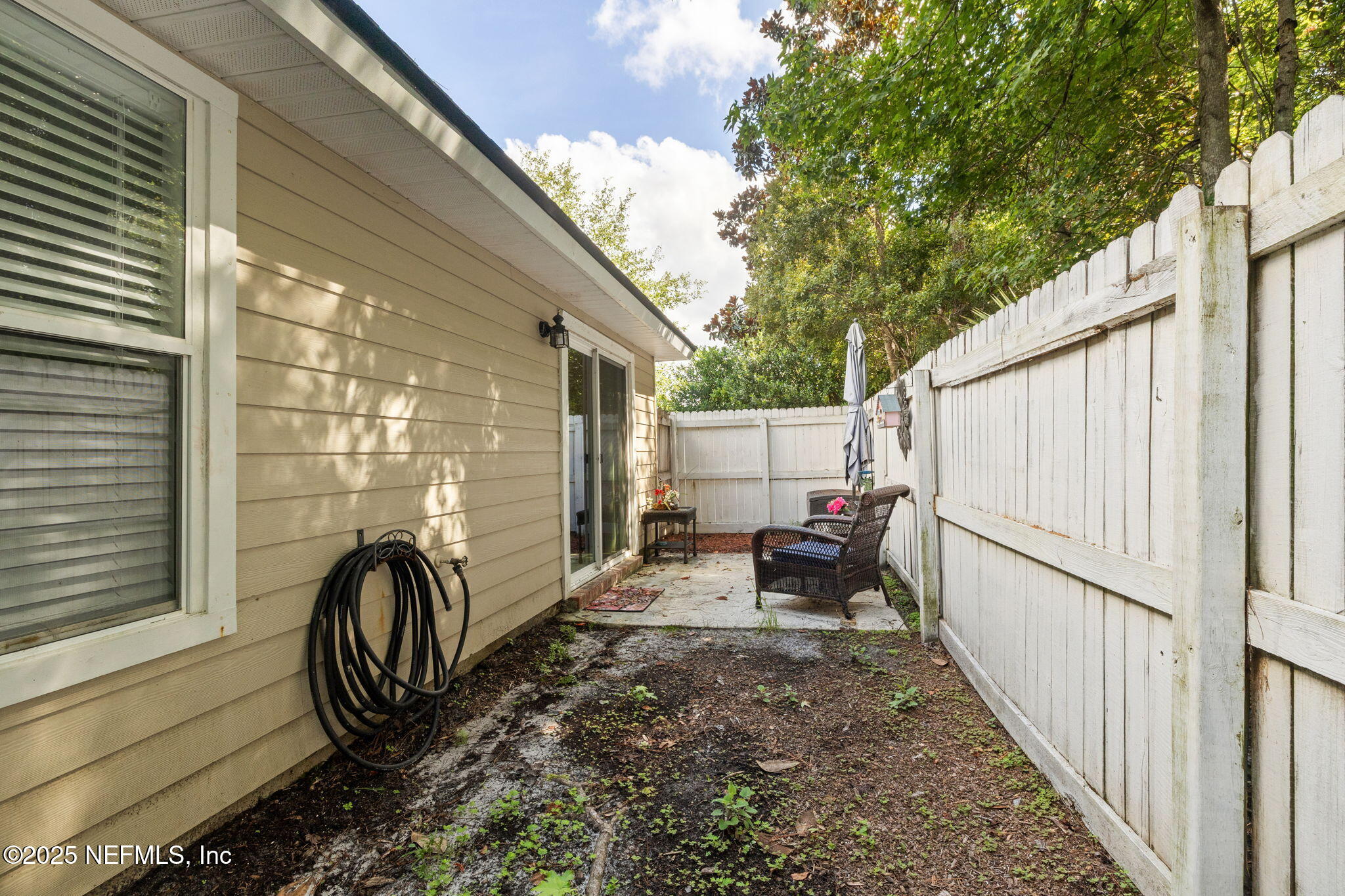 905 Country Bridge Road, Unit 1 St. Johns, FL 32259 - Photo 29 of 43 a view of a back yard from a patio