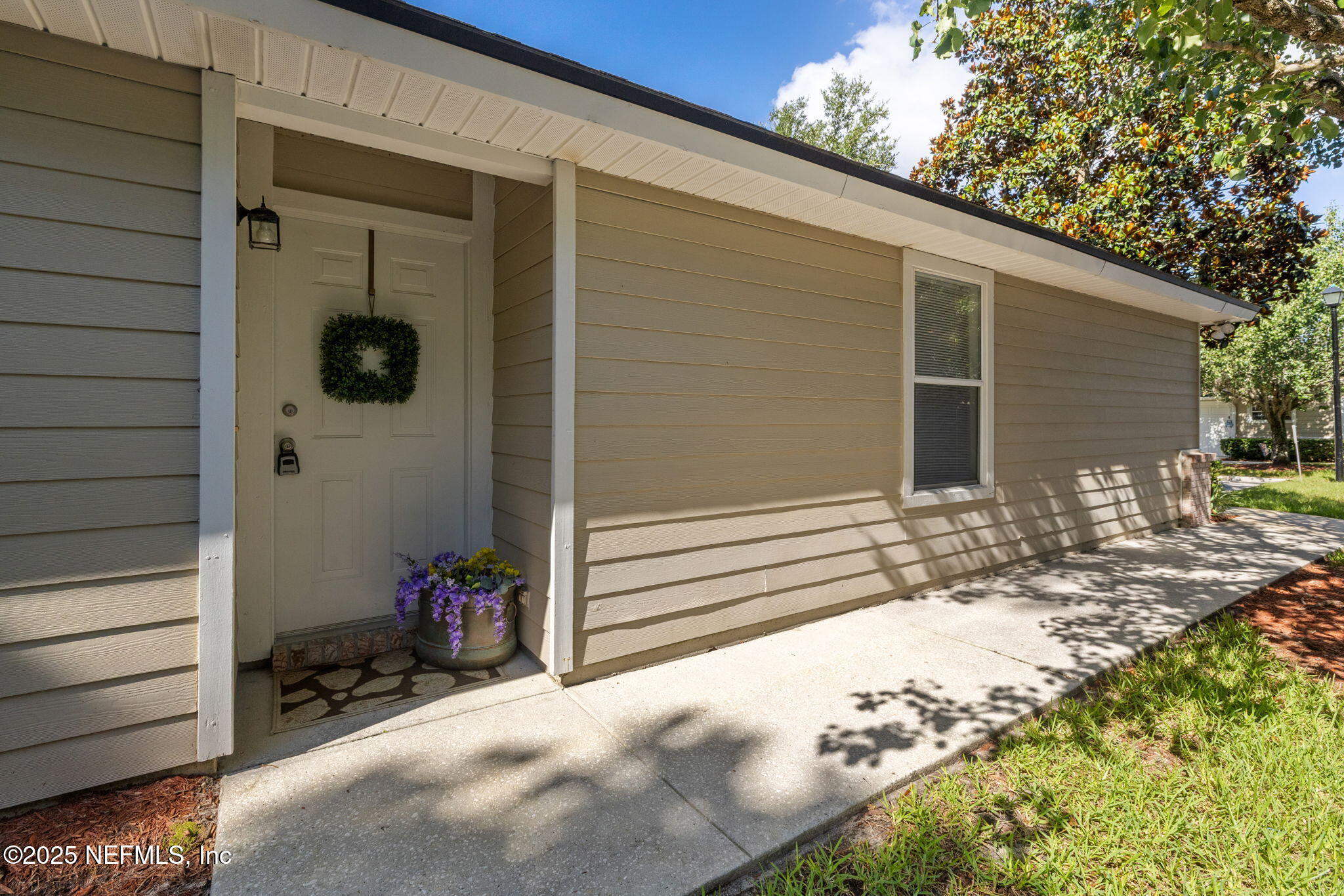 905 Country Bridge Road, Unit 1 St. Johns, FL 32259 - Photo 5 of 43 a view of a house with backyard and sitting area