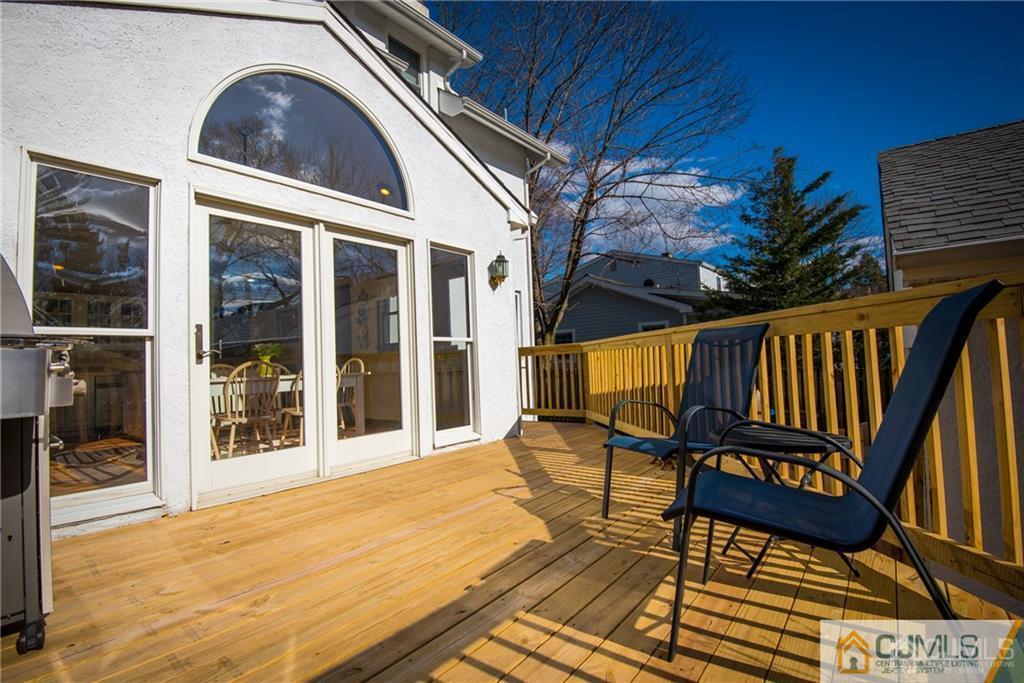 77 Rector Street Metuchen, NJ 08840 - Photo 19 of 24 a view of balcony with wooden floor and seating space