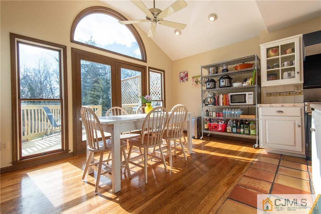 77 Rector Street Metuchen, NJ 08840 - Photo 8 of 24 a view of a dining room with furniture water view and wooden floor