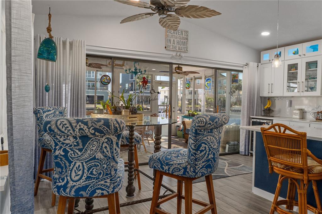 4128 Camelia Drive Hernando Beach, FL 34607 - Photo 18 of 50 a view of a dining room with furniture window and outside view