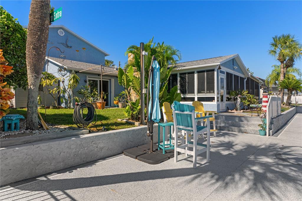4128 Camelia Drive Hernando Beach, FL 34607 - Photo 39 of 50 a view of a house with sitting area and garden