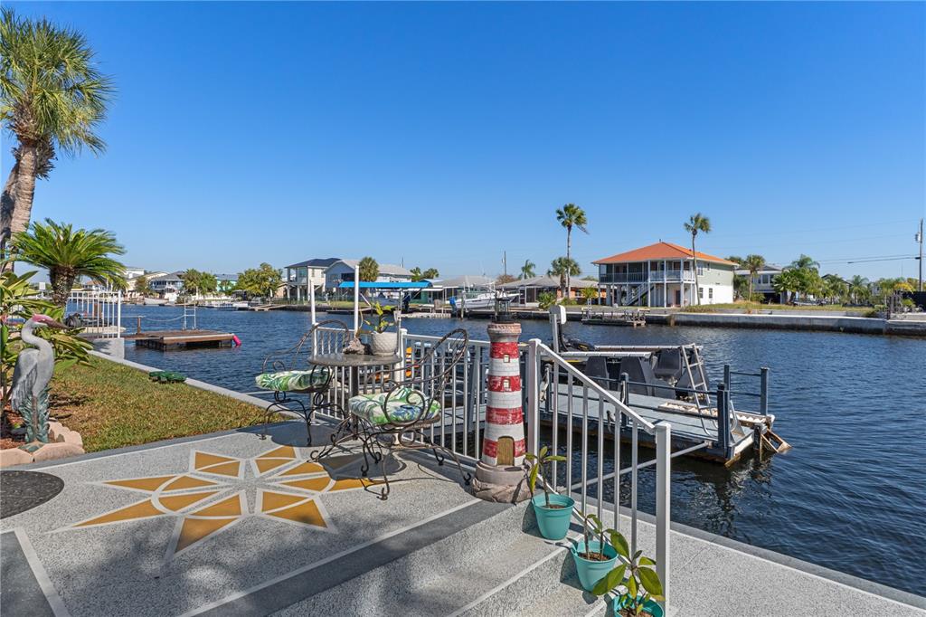 4128 Camelia Drive Hernando Beach, FL 34607 - Photo 43 of 50 a view of a terrace with sitting area
