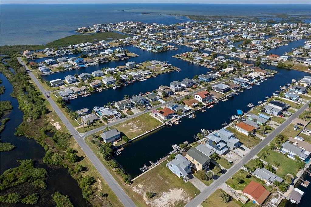 4128 Camelia Drive Hernando Beach, FL 34607 - Photo 49 of 50 an aerial view of a city