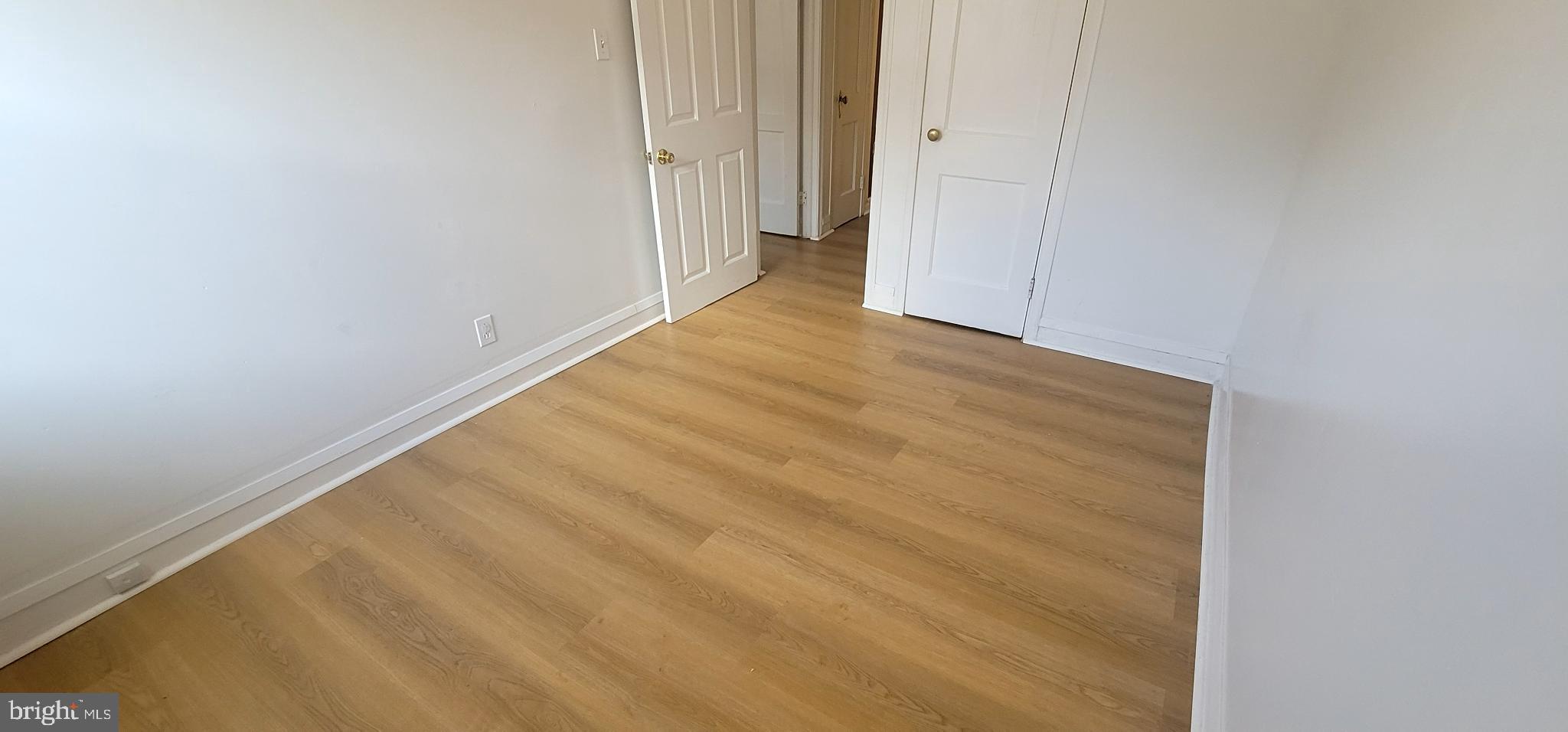 8247 Fayette Street Philadelphia, PA 19150 - Photo 12 of 12 Bright and airy space with warm flooring.