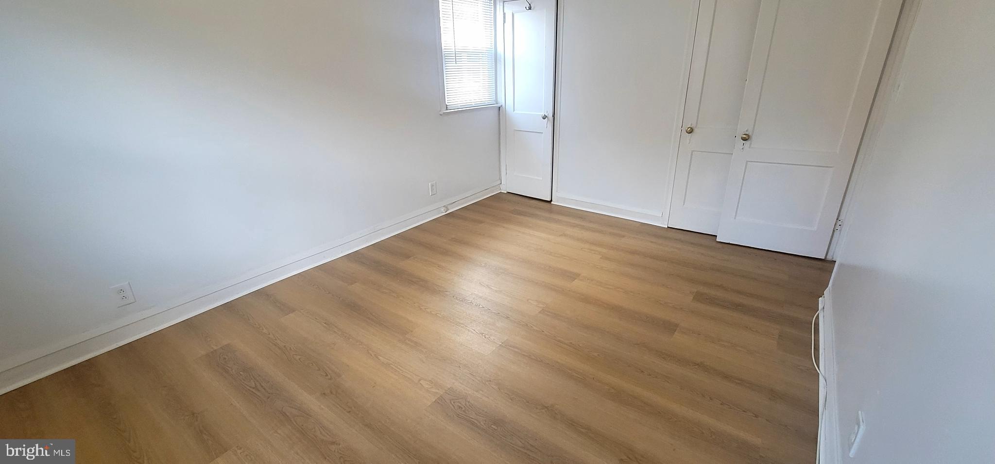 8247 Fayette Street Philadelphia, PA 19150 - Photo 10 of 12 Bright and airy space with warm flooring.