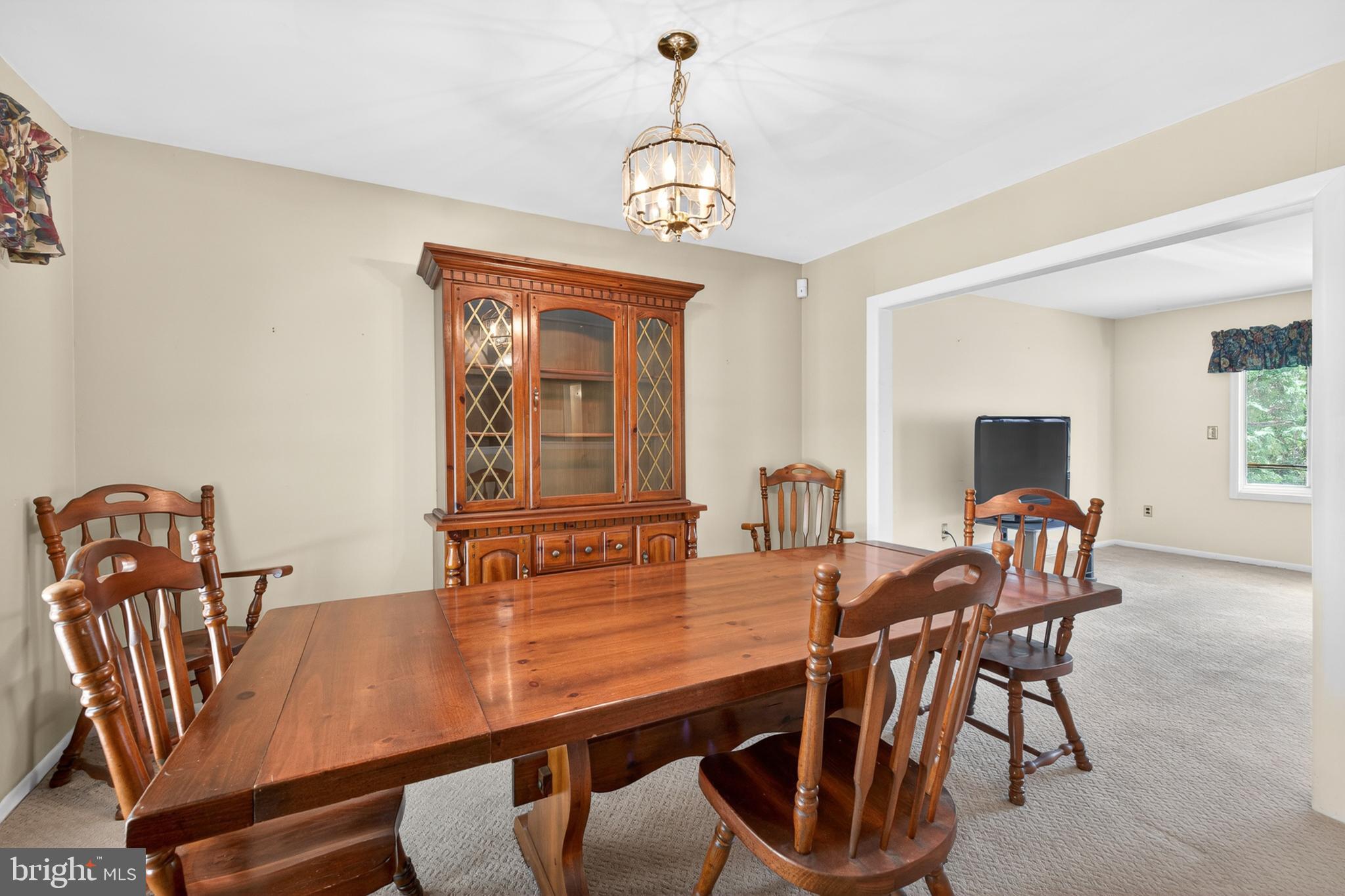 3701 Ebright Road Chadds Ford, PA 19317 - Photo 20 of 45 a dining room with furniture window and wooden floor