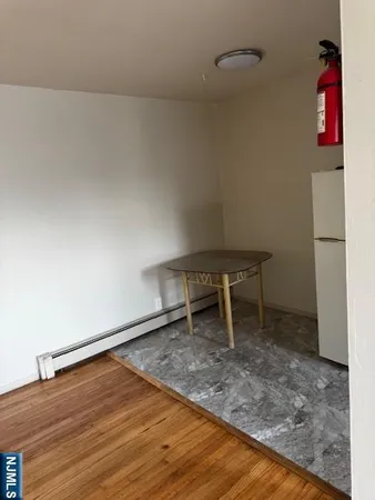 a white bench sitting in a room