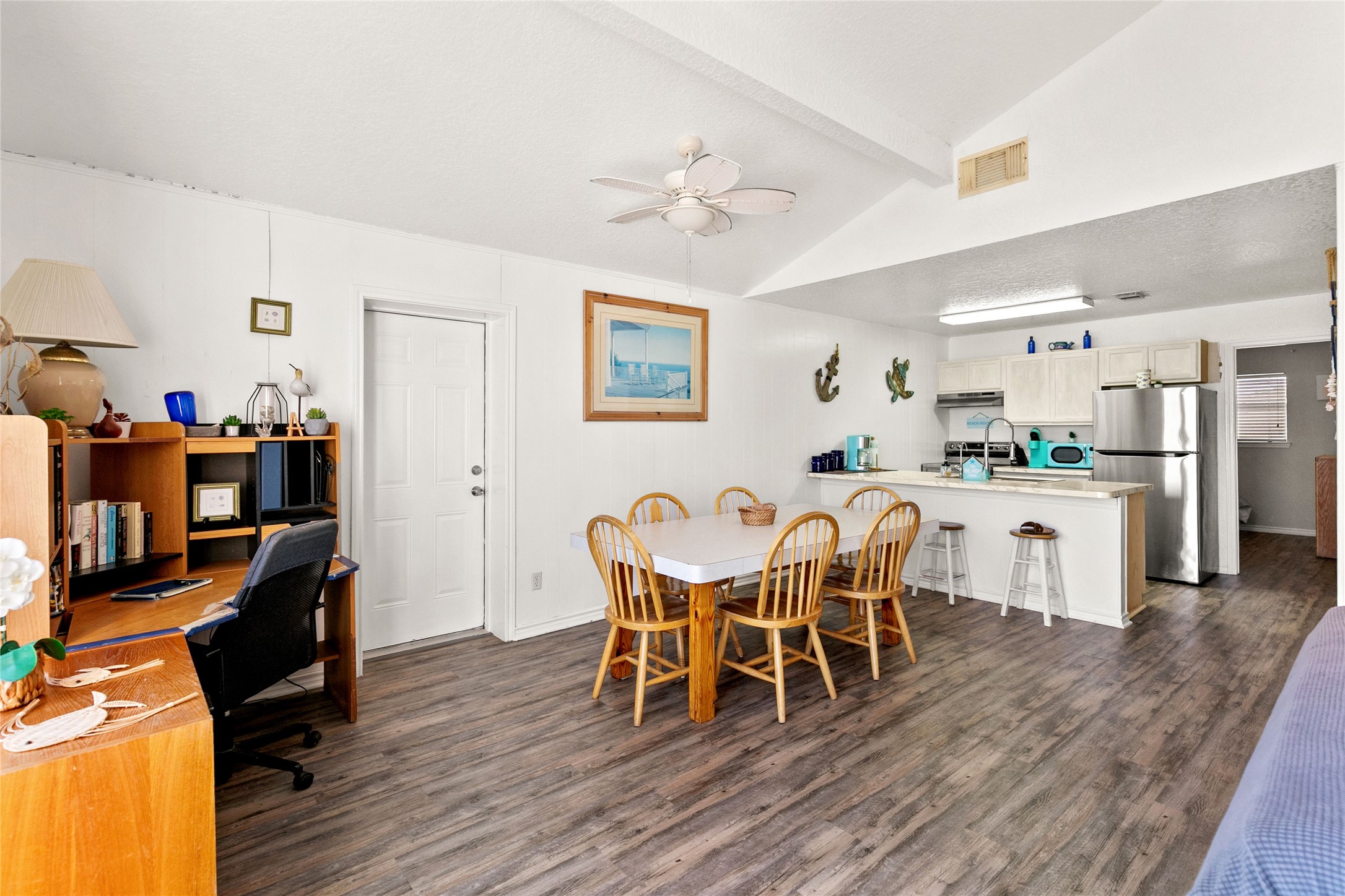 314 Beach Drive Surfside Beach, TX 77541 - Photo 11 of 38 a dining room with furniture and wooden floor