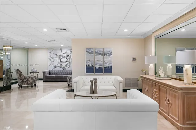 a bathroom with a sink mirror and toilet