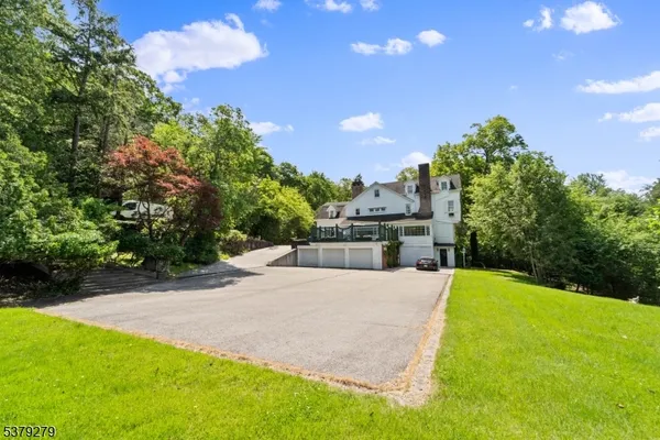 a view of a backyard with tree s