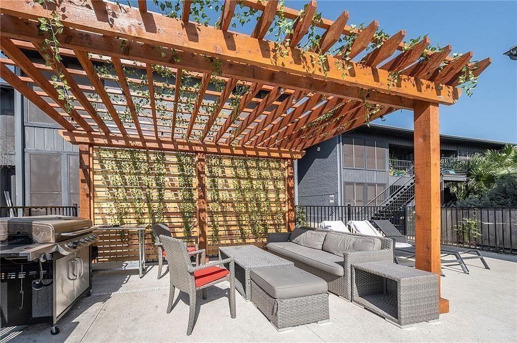 909 Reinli Street, Unit 217 Austin, TX 78751 - Photo 22 of 22 a outdoor living space with patio furniture