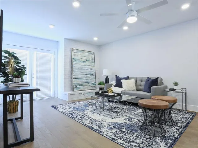 a living room with furniture and a couch