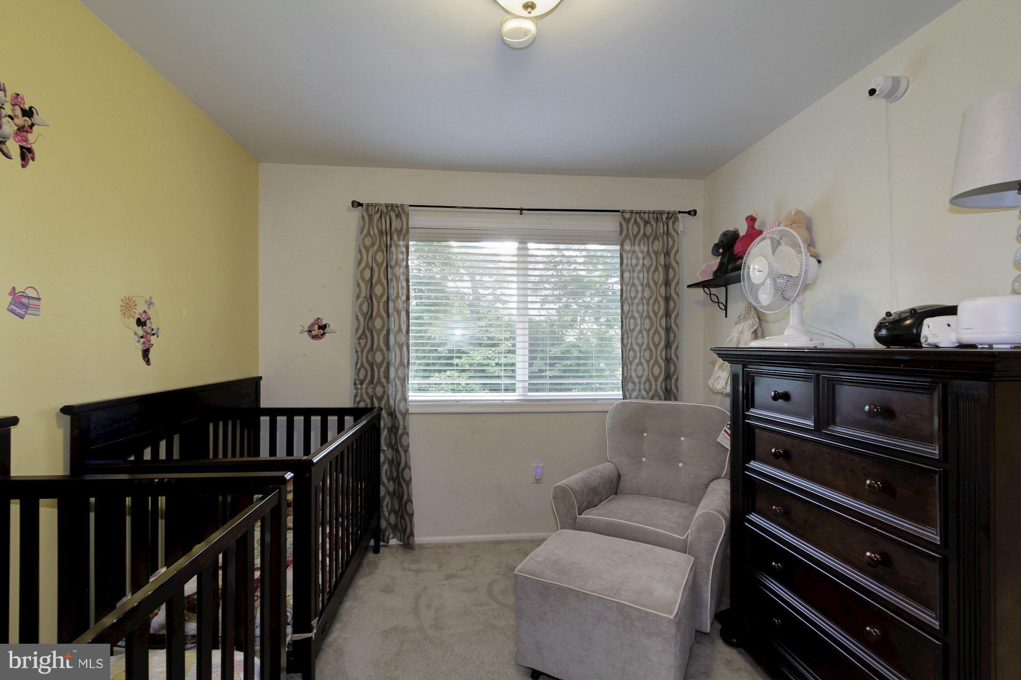 14804 Stonegate Terrace Silver Spring, MD 20905 - Photo 14 of 30 a living room with furniture and wooden floor
