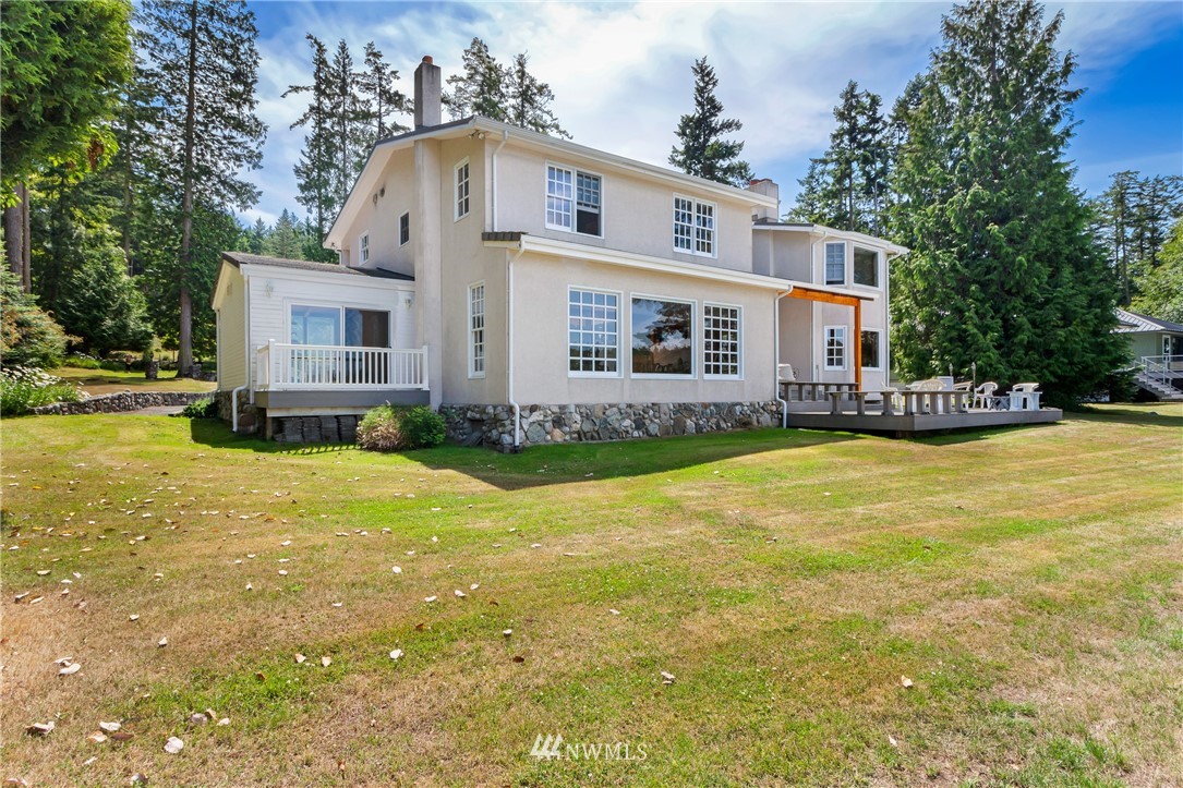 2461 Turn Point Road Friday Harbor, WA 98250 - Photo 3 of 25 a front view of house with yard and swimming pool