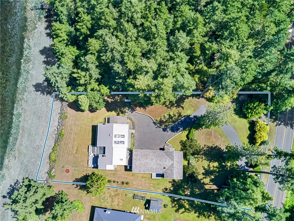 2461 Turn Point Road Friday Harbor, WA 98250 - Photo 21 of 25 an aerial view of a house with a yard