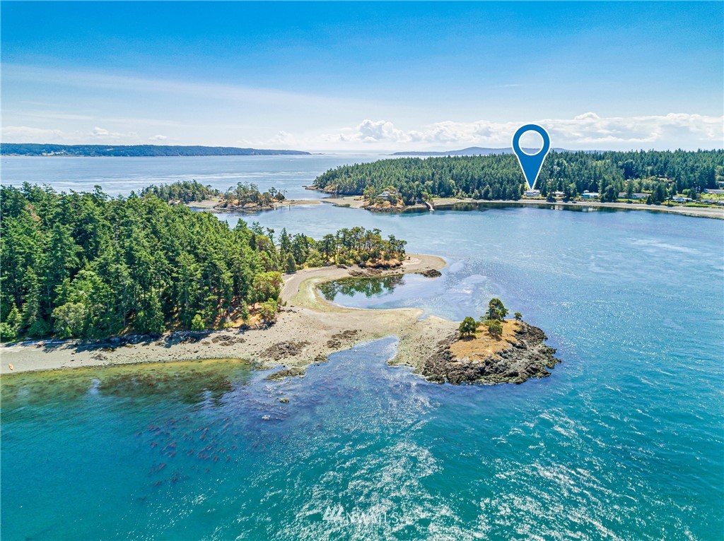 2461 Turn Point Road Friday Harbor, WA 98250 - Photo 22 of 25 a front view of a house with a yard and lake view