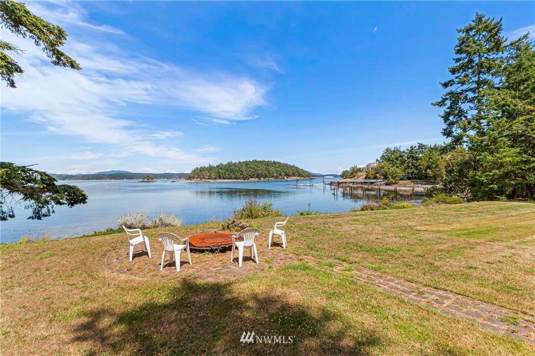 2461 Turn Point Road Friday Harbor, WA 98250 - Photo 24 of 25 a lake with boats and trees in the background
